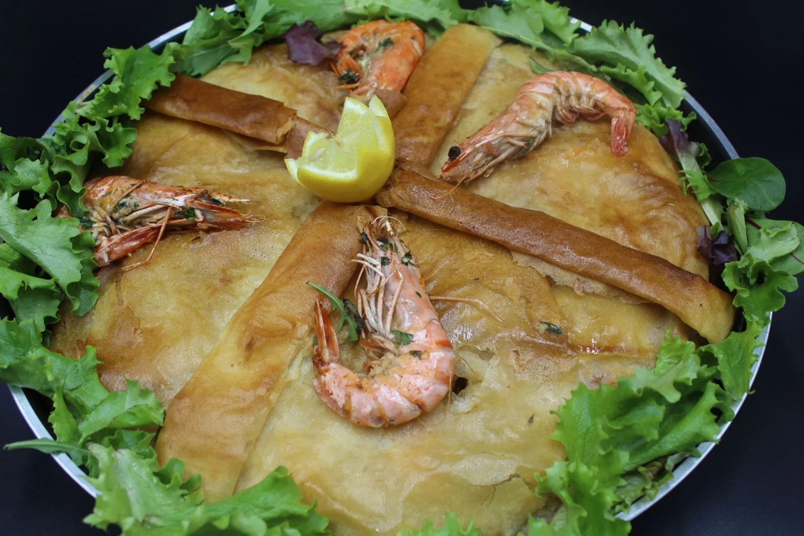 Pastilla aux fruits de mer préparée par Maral Events